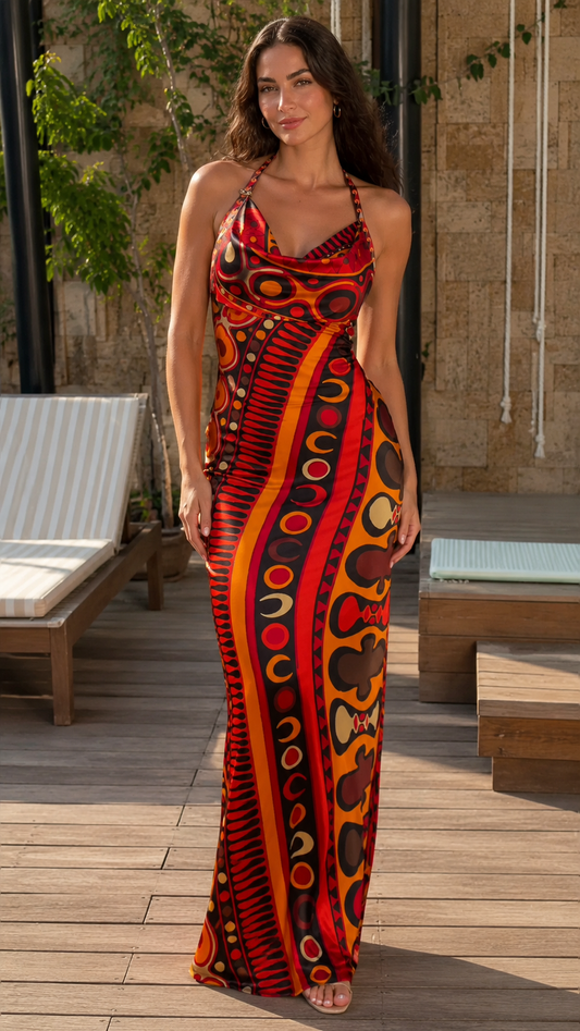 Front view of red abstract print halter cowl neck maxi dress
