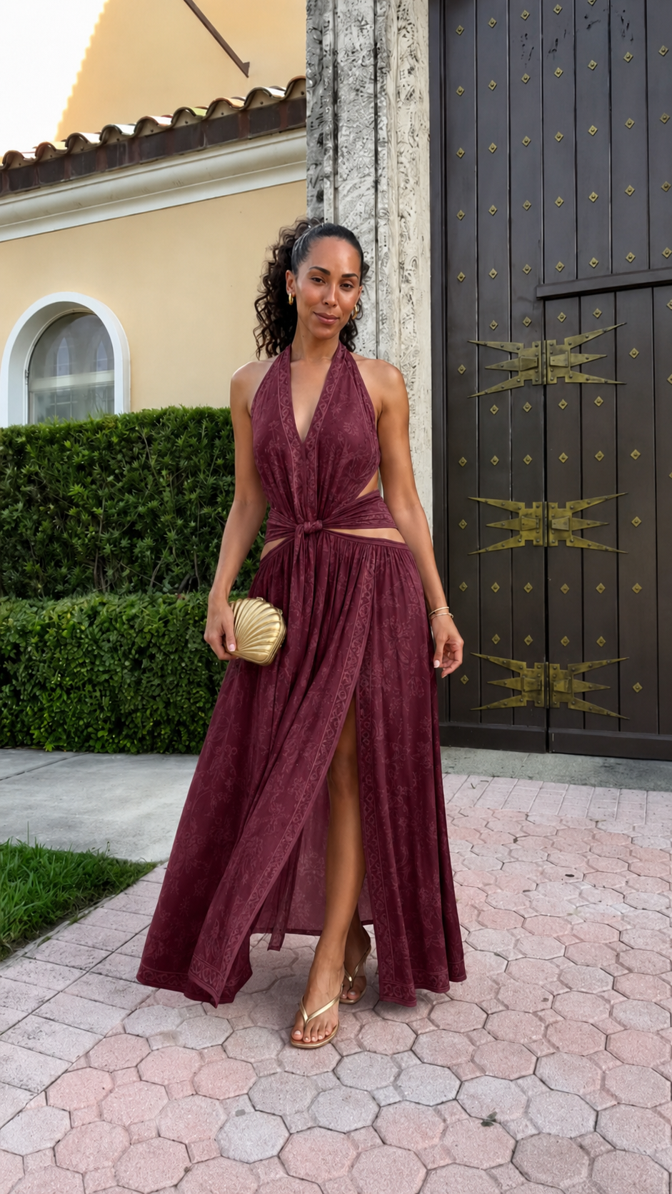 Burgundy halter maxi dress with gathered bodice and flowing skirt