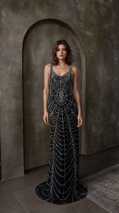 Front view of black beaded evening maxi dress