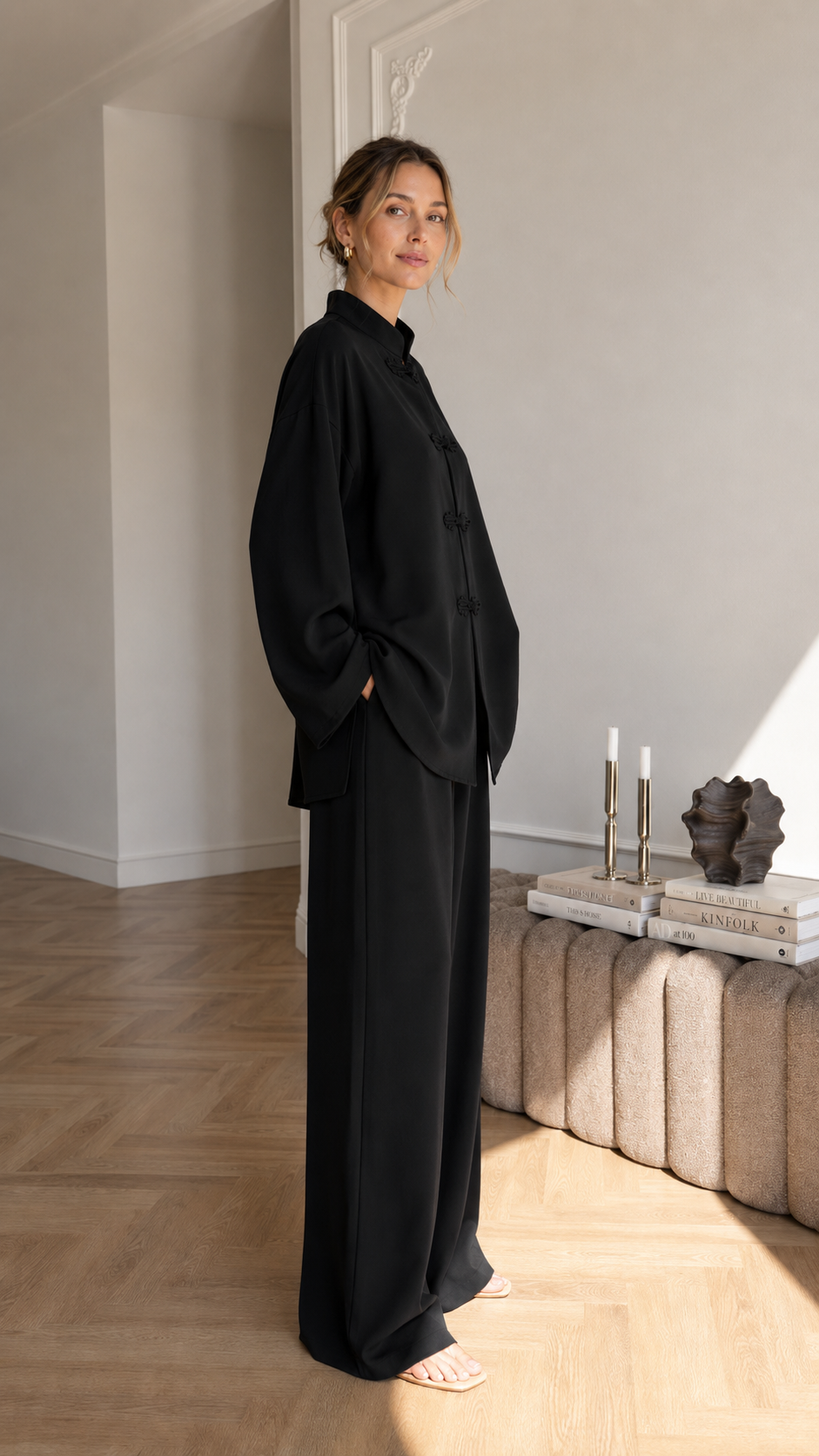 Women's black mandarin collar two-piece lounge set with long sleeve top and wide leg pants side view