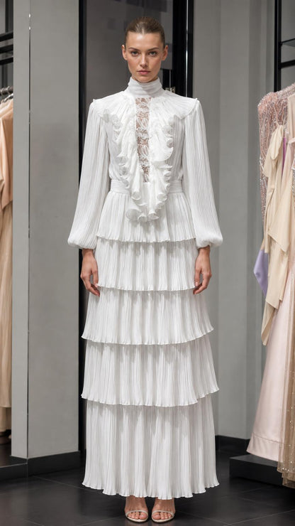 Front view of elegant white pleated high-neck maxi dress with ruffles