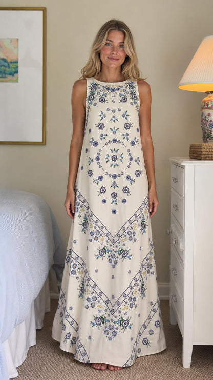 Front view of ivory floral embroidered maxi dress