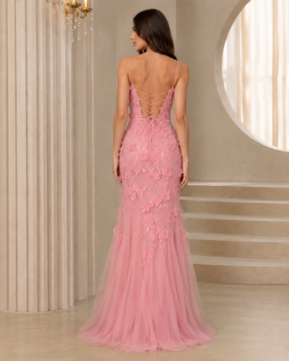 Back view of blush pink floral appliqué mermaid maxi dress with lace-up open back