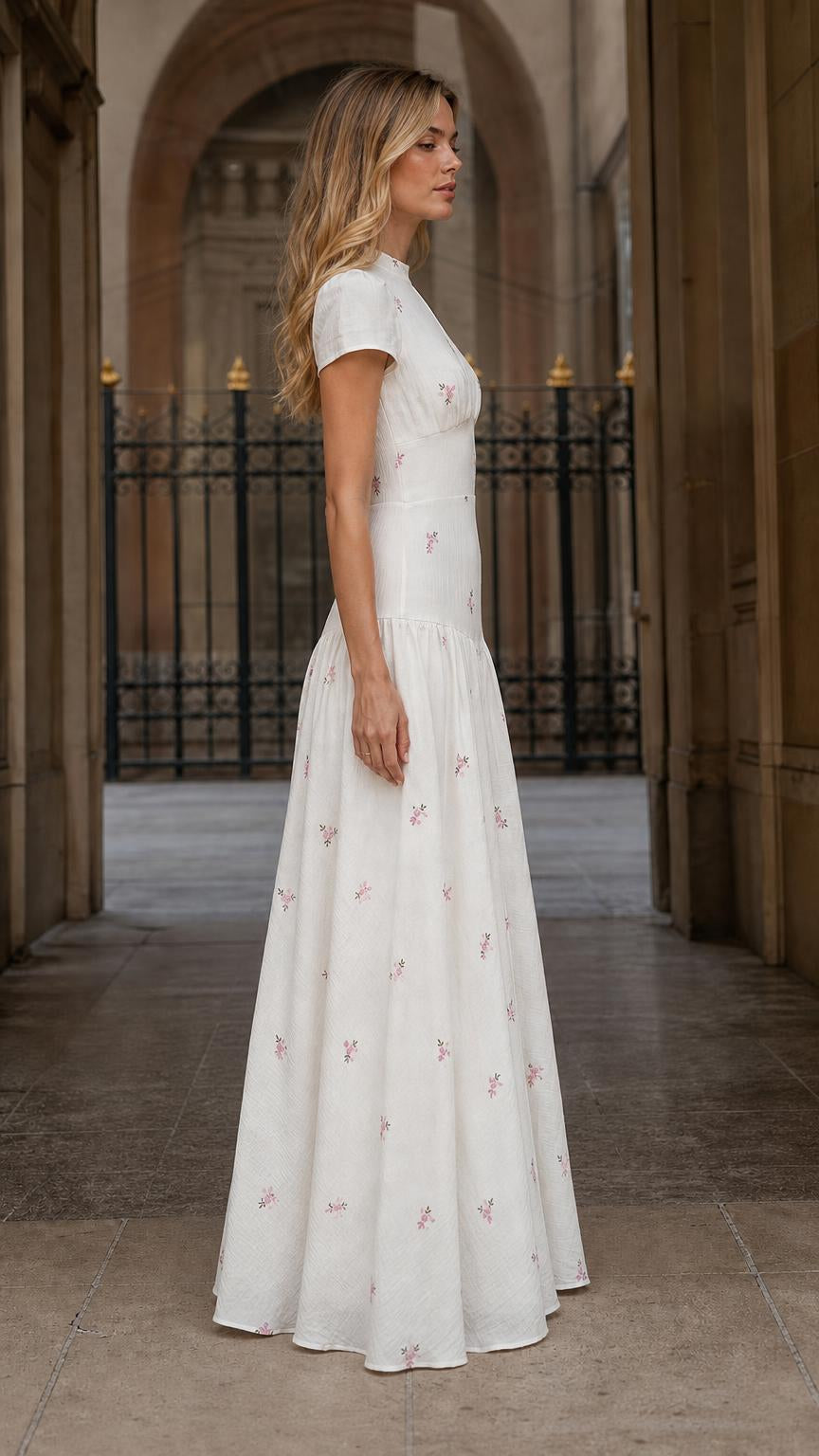 Side profile view of White floral embroidered maxi dress