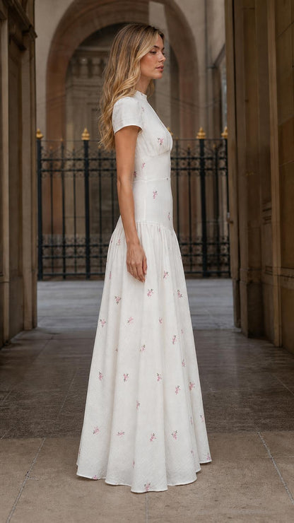 Side profile view of White floral embroidered maxi dress