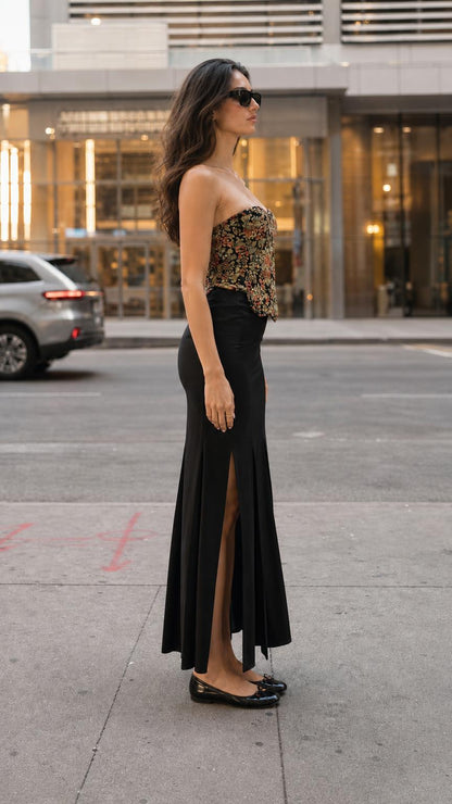 Side view of model wearing multi floral jacquard bustier top