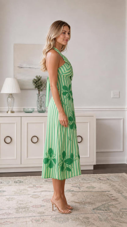 Side view of green striped midi dress