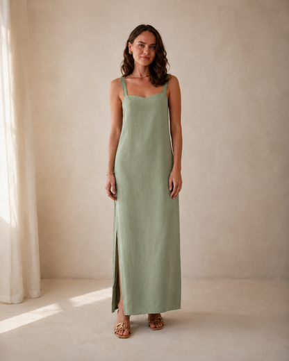 Front view of sage green sleeveless square neck maxi slip dress with side slit