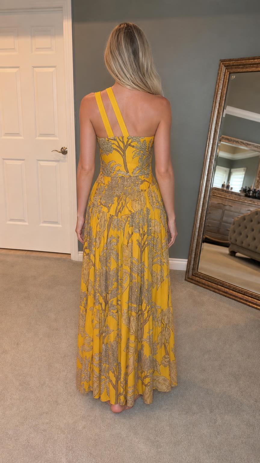 Back view showcasing multi-strap design on yellow maxi dress