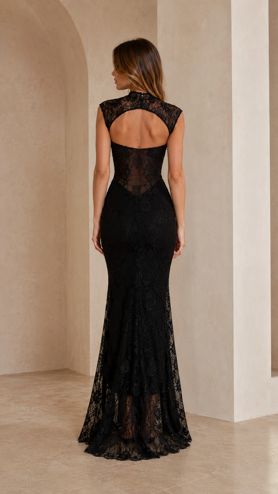 Back view of black lace mermaid maxi dress with open back detail