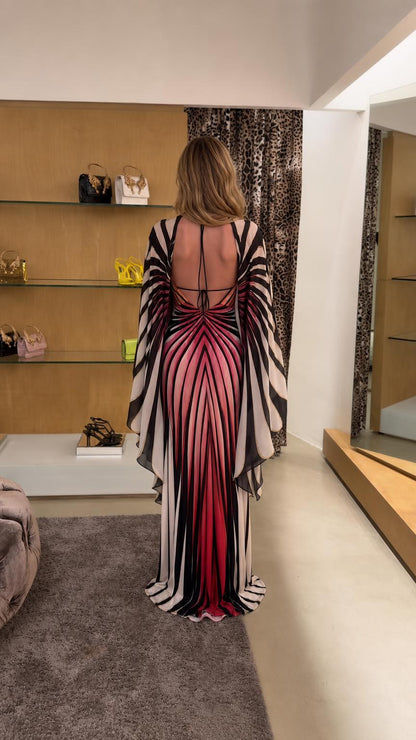 Back view showing open back and straps