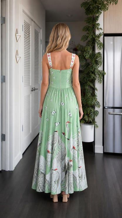Back view of model in sage green maxi dress