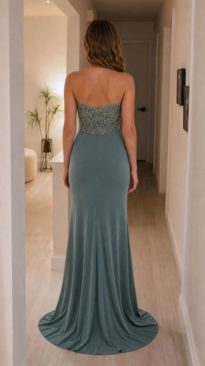 Back view of sage green strapless formal gown