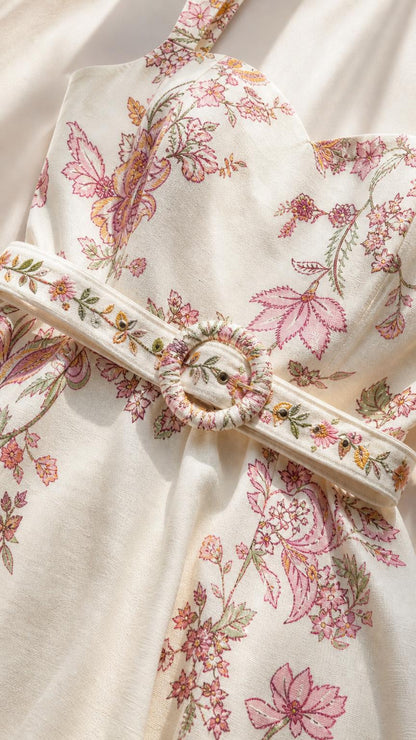 Close-up detail of embroidered bodice and matching belt