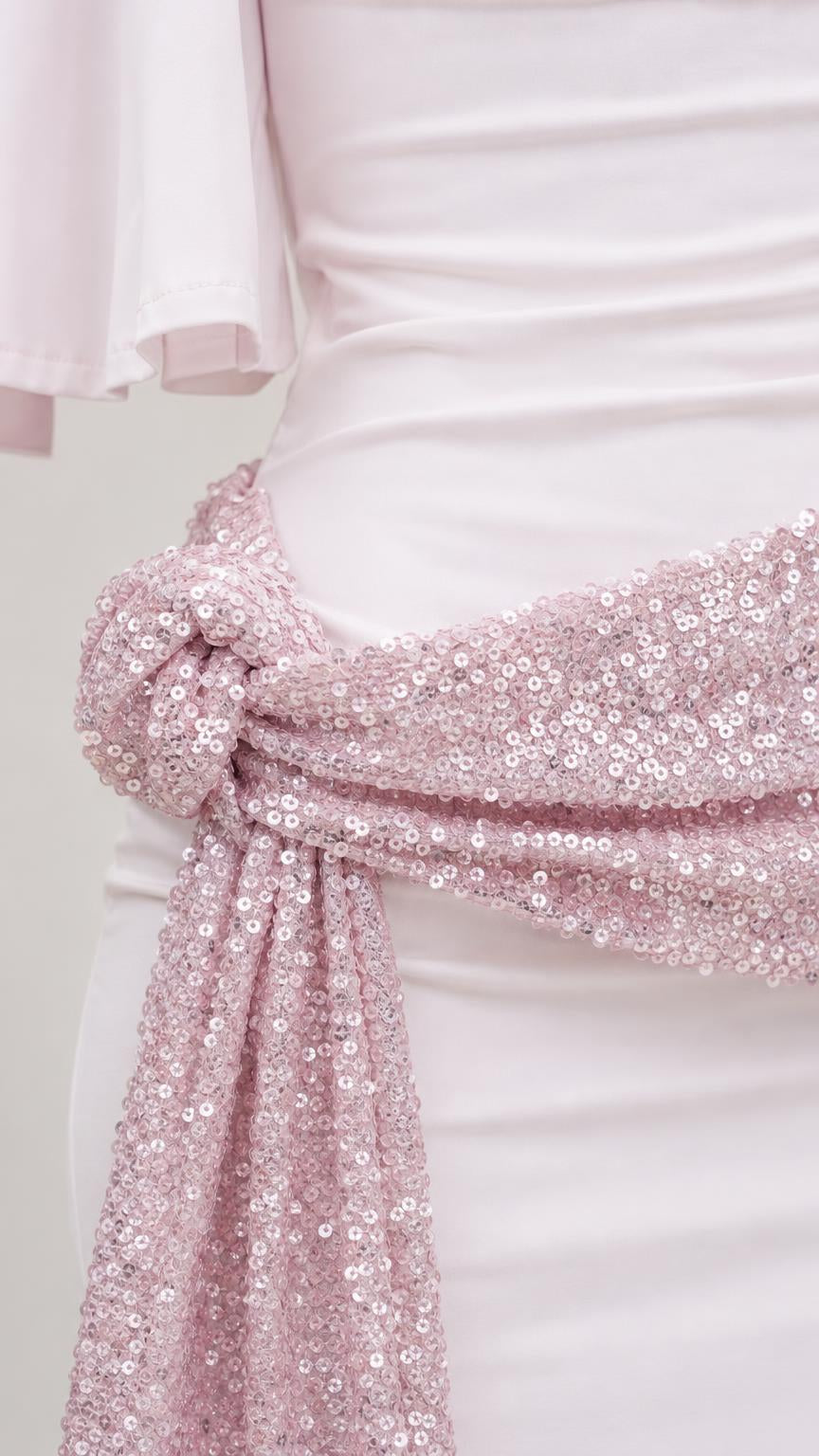 Close-up detail of the pink sequin waist tie