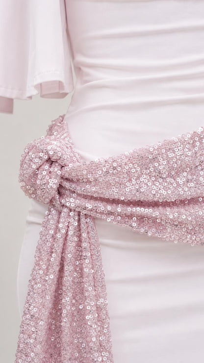 Close-up detail of the pink sequin waist tie