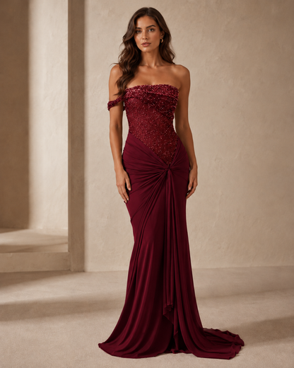 Burgundy off-shoulder beaded mermaid gown with ruched front detail
