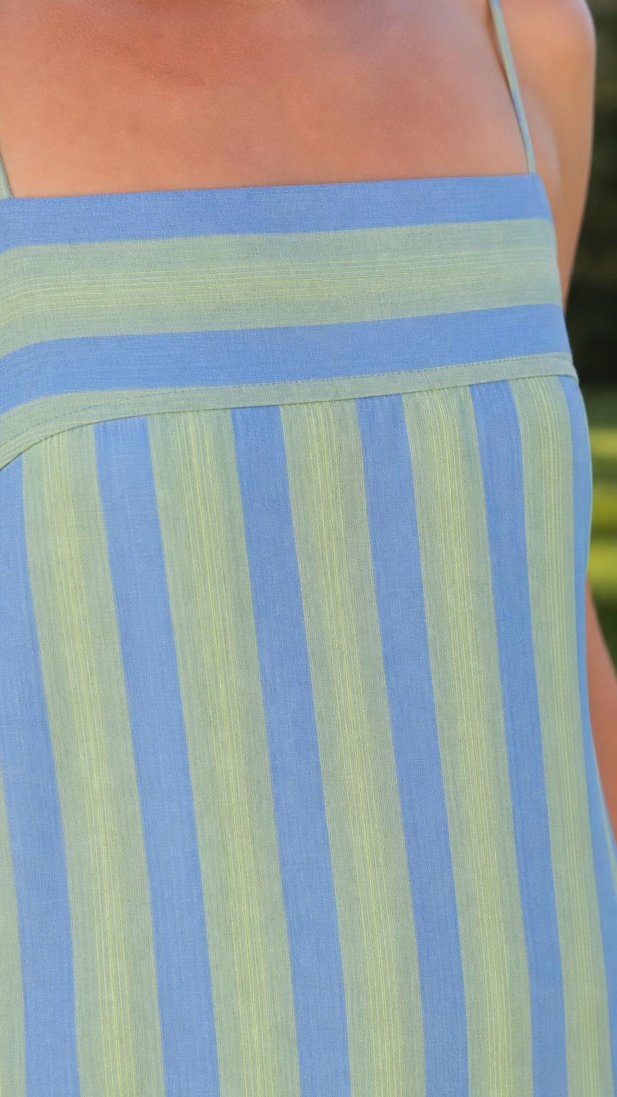 Close-up detail of square neckline and blue stripes