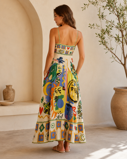 Back view of multicolor printed strappy maxi dress with slim shoulder straps