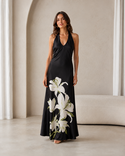 Black halter maxi dress with oversized white lily print