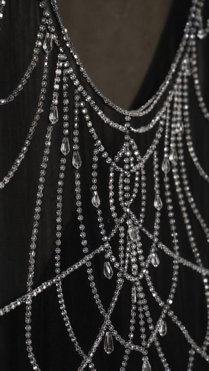 Close-up detail of crystal beading web pattern