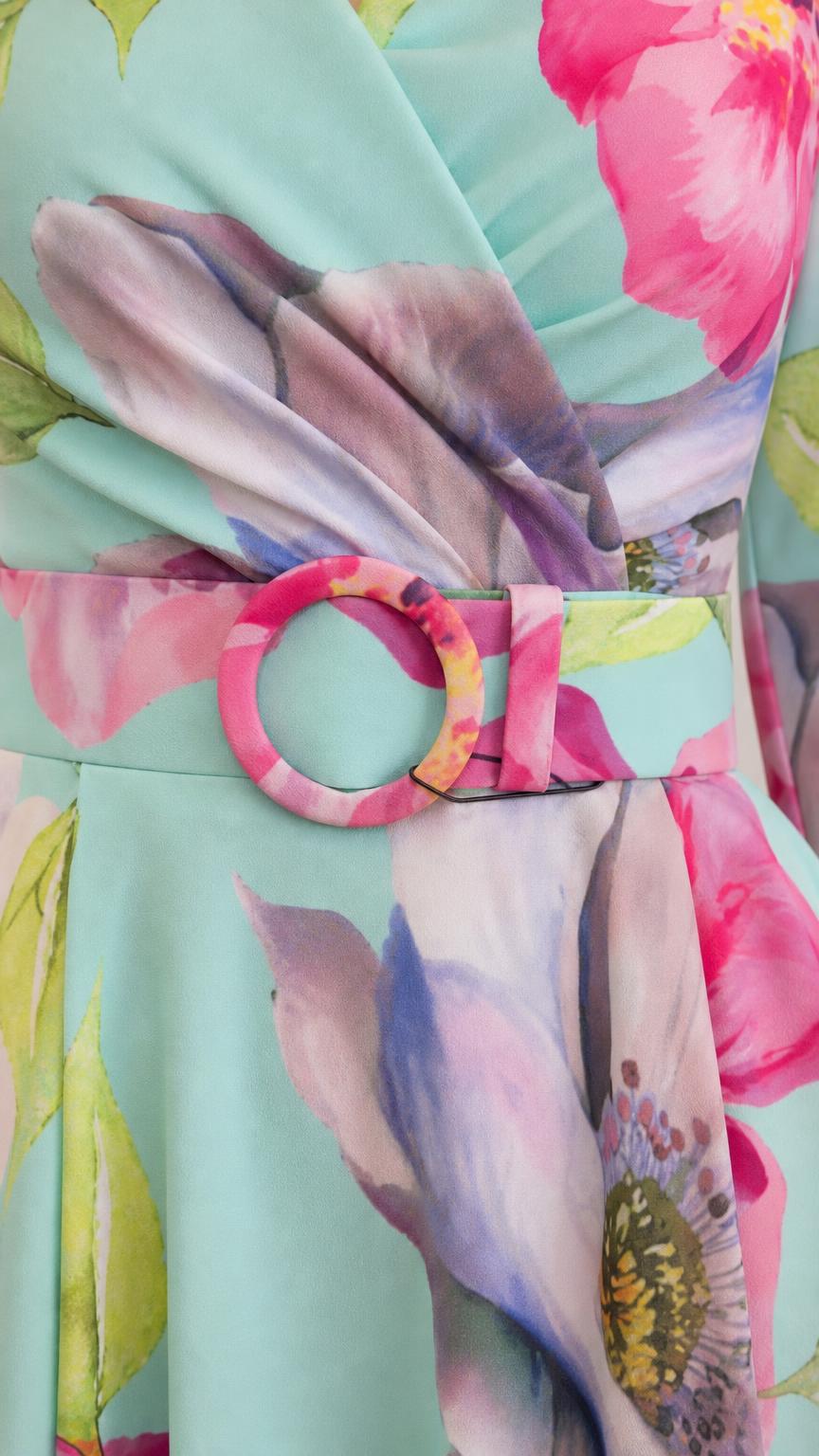 Close up of belt and fabric on mint floral dress