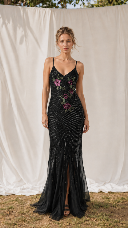 Front view of black embroidered sequin mermaid maxi dress