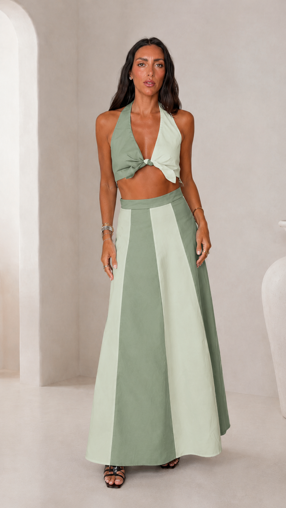 Front view of sage green halter crop top and matching maxi skirt set