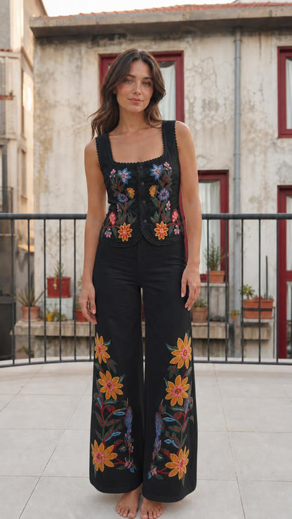 Front view of black color variant of the floral embroidered vest and pants set