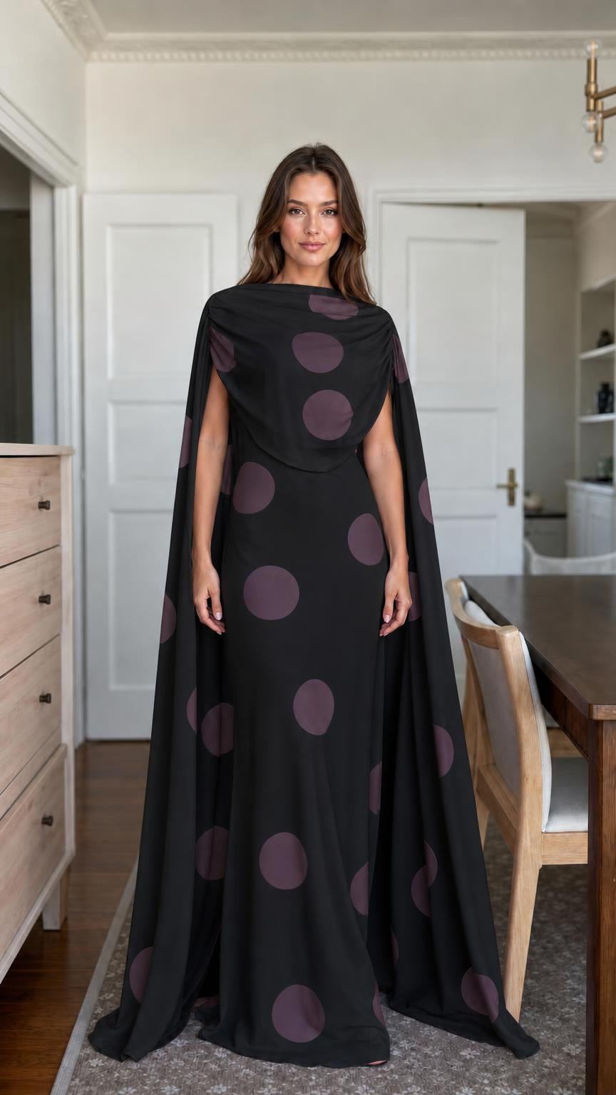 Black polka dot cape maxi dress front view