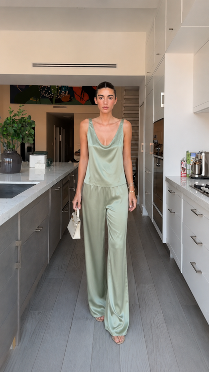 Full front view of sage satin-look cowl neck matching pants set