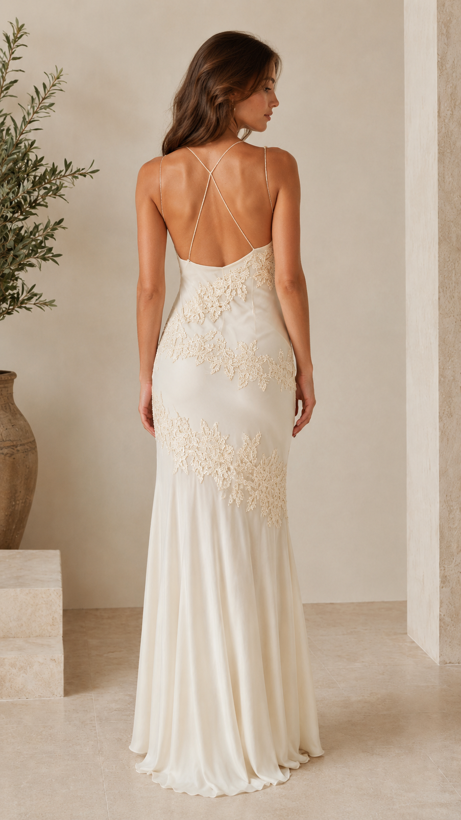 Back view of ivory maxi slip dress with open back and crisscross straps