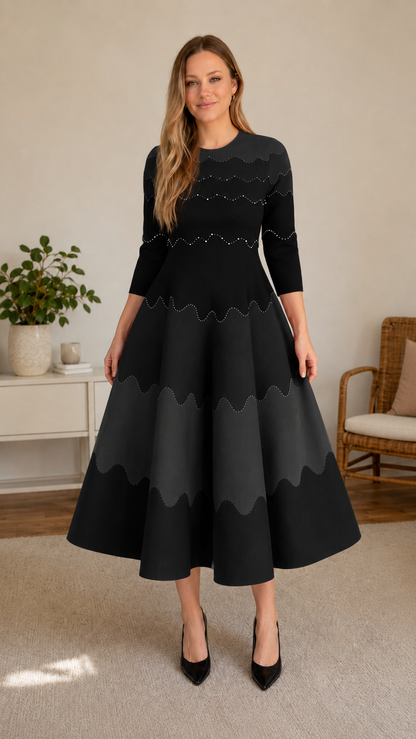 Front view of black scalloped colorblock midi dress with structured full skirt