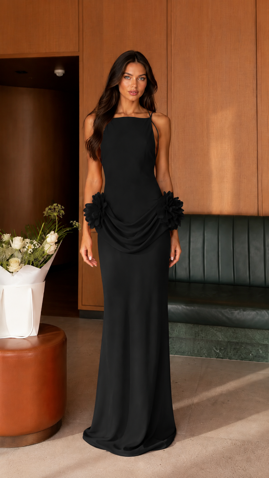 Front view of black open back draped floral detail maxi dress