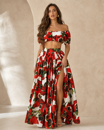 Woman wearing a red floral off shoulder two piece skirt set front view