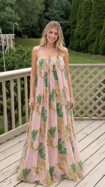 Model wearing pink floral strapless maxi dress