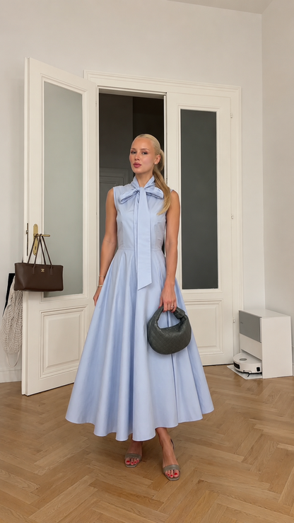 Front view of powder blue sleeveless bow neck midi dress