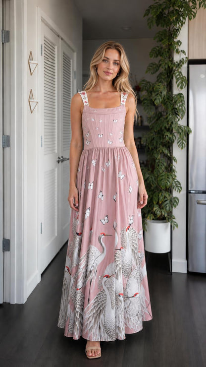 Model wearing pink color variant of crane maxi dress