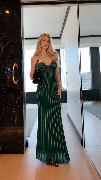 Front view of green striped spaghetti strap mermaid maxi dress