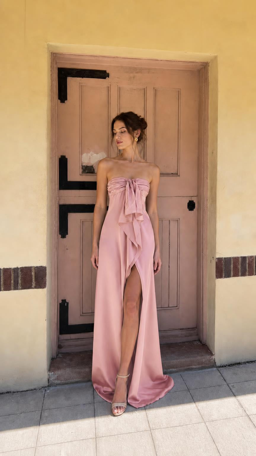 Pink strapless evening dress with front bow and high slit