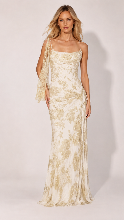 Front view of ivory glitter mesh formal gown with draped neckline and side gathering