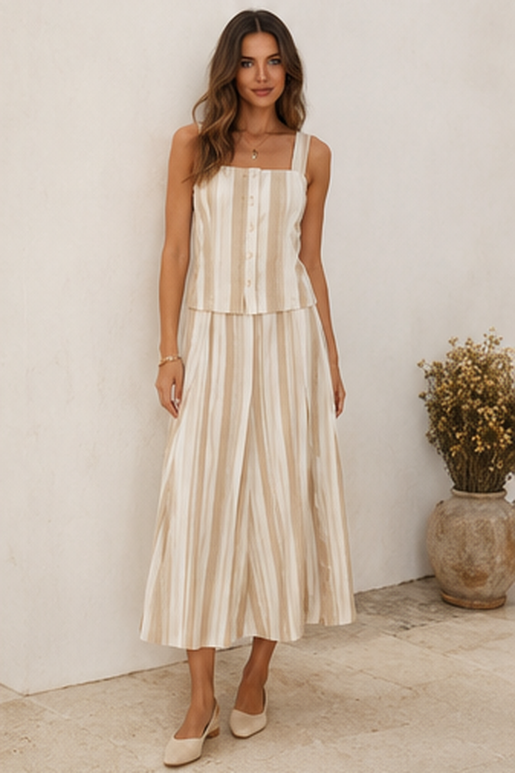 Ivory striped sleeveless top and wide-leg pants matching set