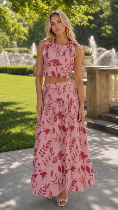 Woman wearing pink floral two-piece set outdoors