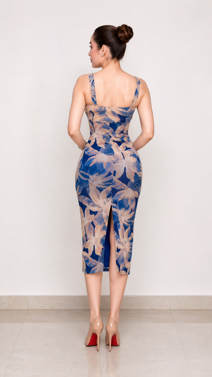 Back view of blue floral bodycon midi dress with back slit