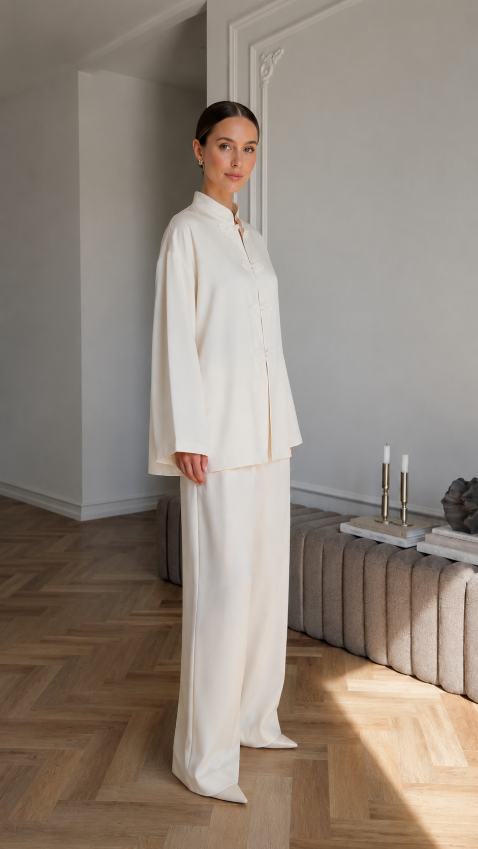 Women's cream two-piece lounge set side view with relaxed long sleeve top