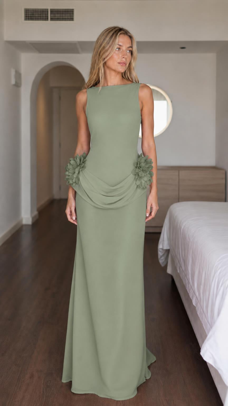 Woman wearing sage green formal maxi dress with floral details