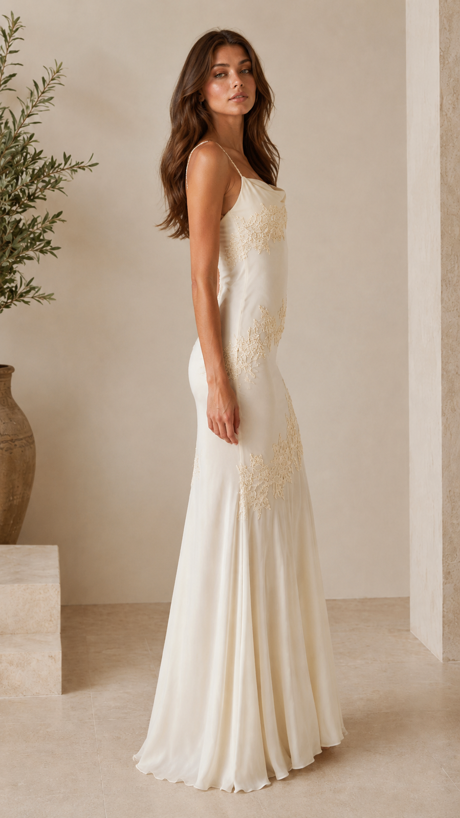 Side view of ivory satin-look lace appliqué maxi slip dress