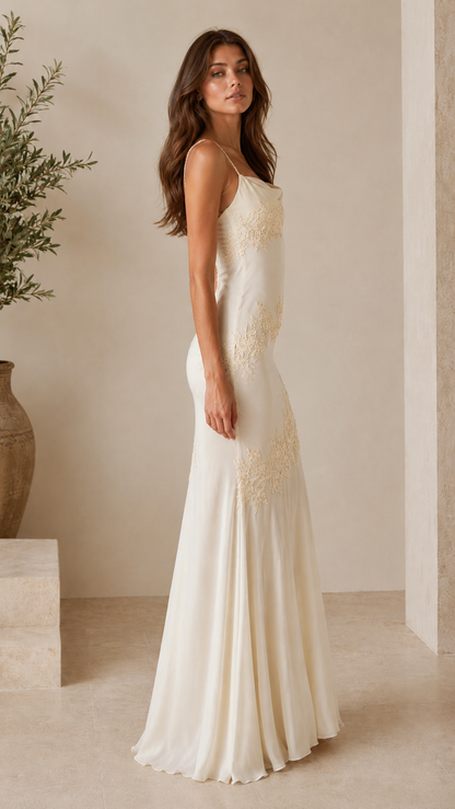 Side view of ivory satin-look lace appliqué maxi slip dress