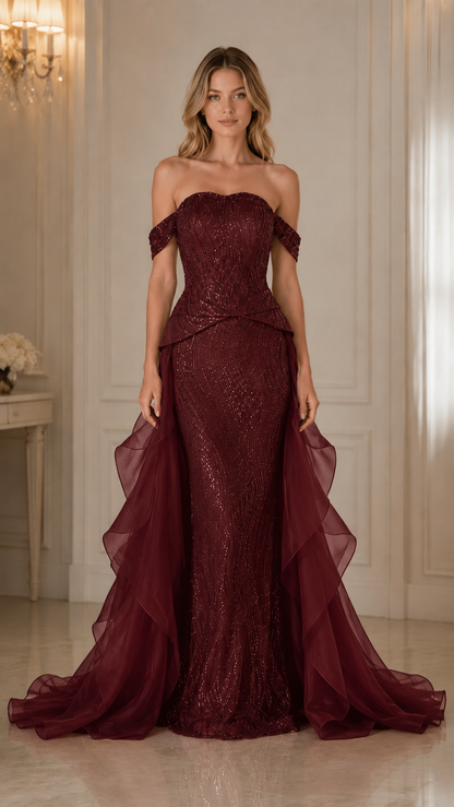 Front view of burgundy off shoulder mermaid gown with sparkling texture and train