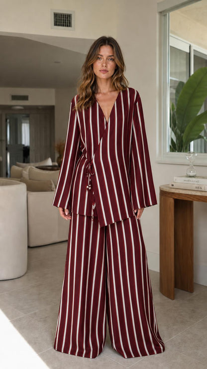 Model wearing burgundy striped two-piece set